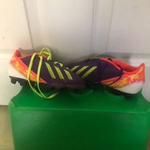 Purple and lime green adidas cleats